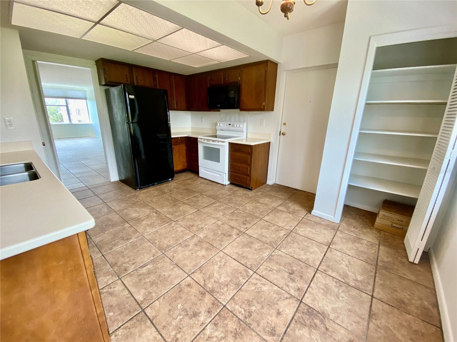 Panty and door to laundry - 2403 S ARDSON PL #402B, TAMPA