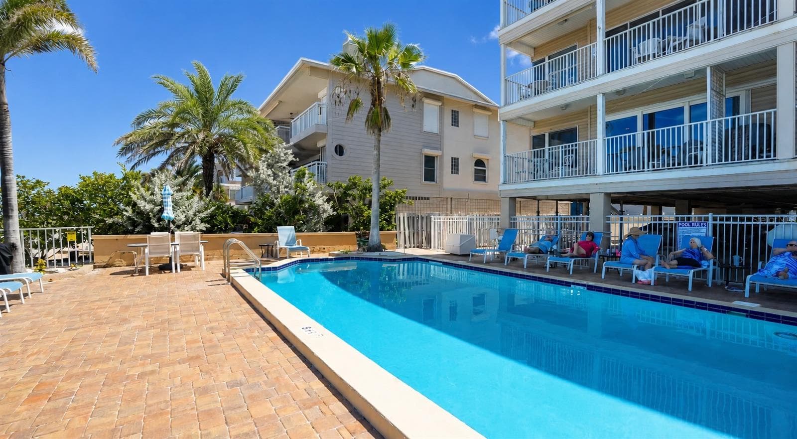 Community Pool with Ocean view and Direct beach access - 1802 GULF BLVD #8, INDIAN ROCKS BEACH