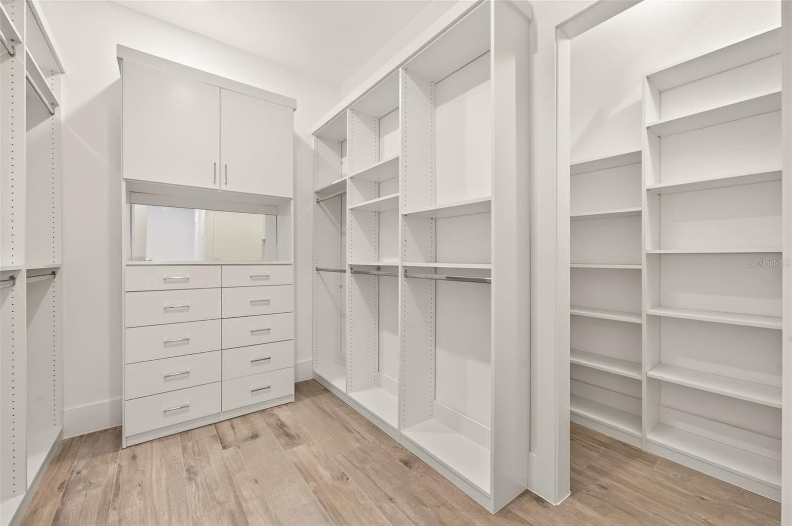 Primary bedroom walk-in closet - 2343 VERSAILLES AVE, WINTER PARK