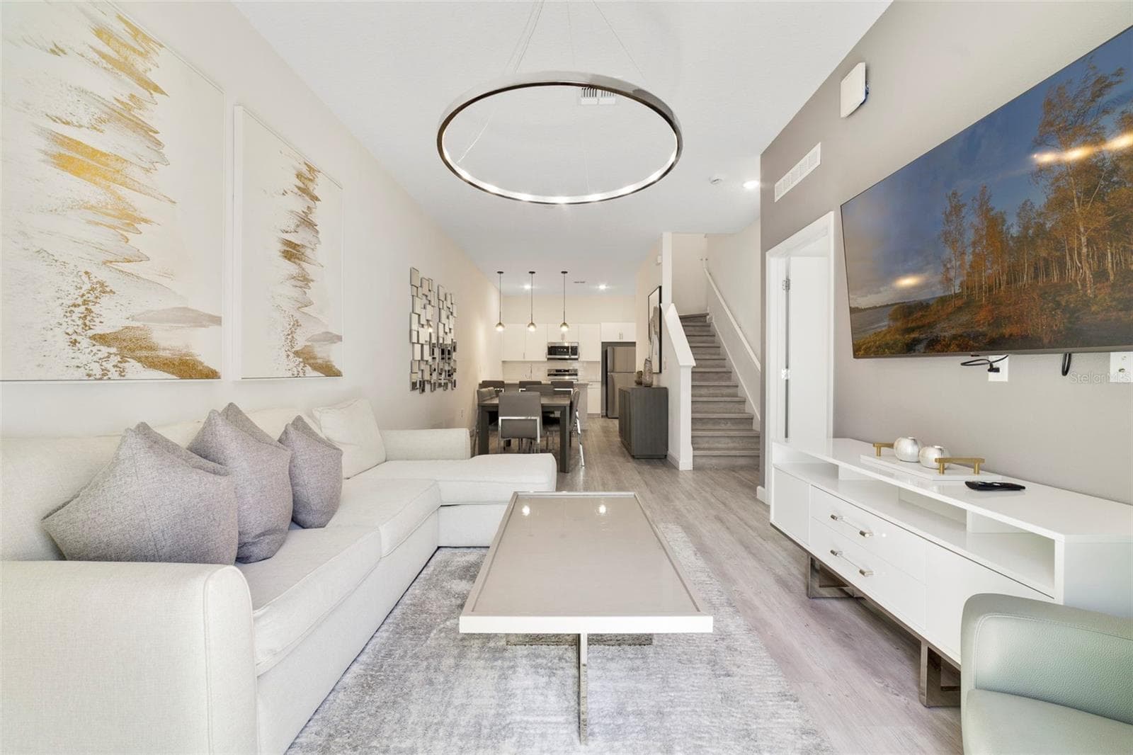 Open concept main floor filled with upgraded finishes and fixtures. - 340 FAMAGUSTA DR, DAVENPORT
