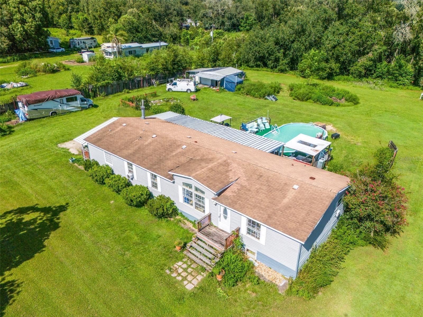 Manufactured Home at 8512 HAMSTER DR, ZEPHYRHILLS, photo 2 of 59