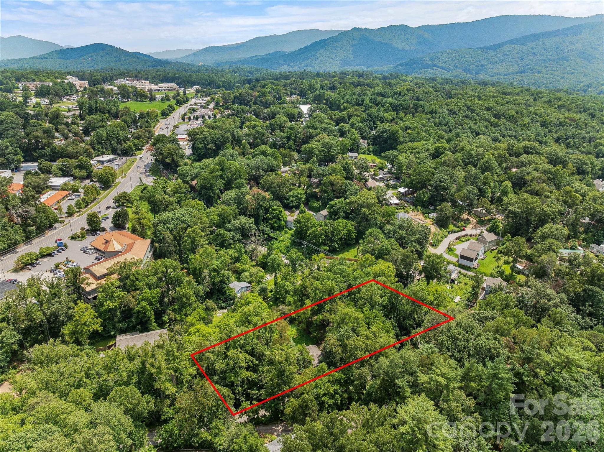 Aerial view looking toward the Blue Ridge Parkway. - 468 Governors View Road, Asheville