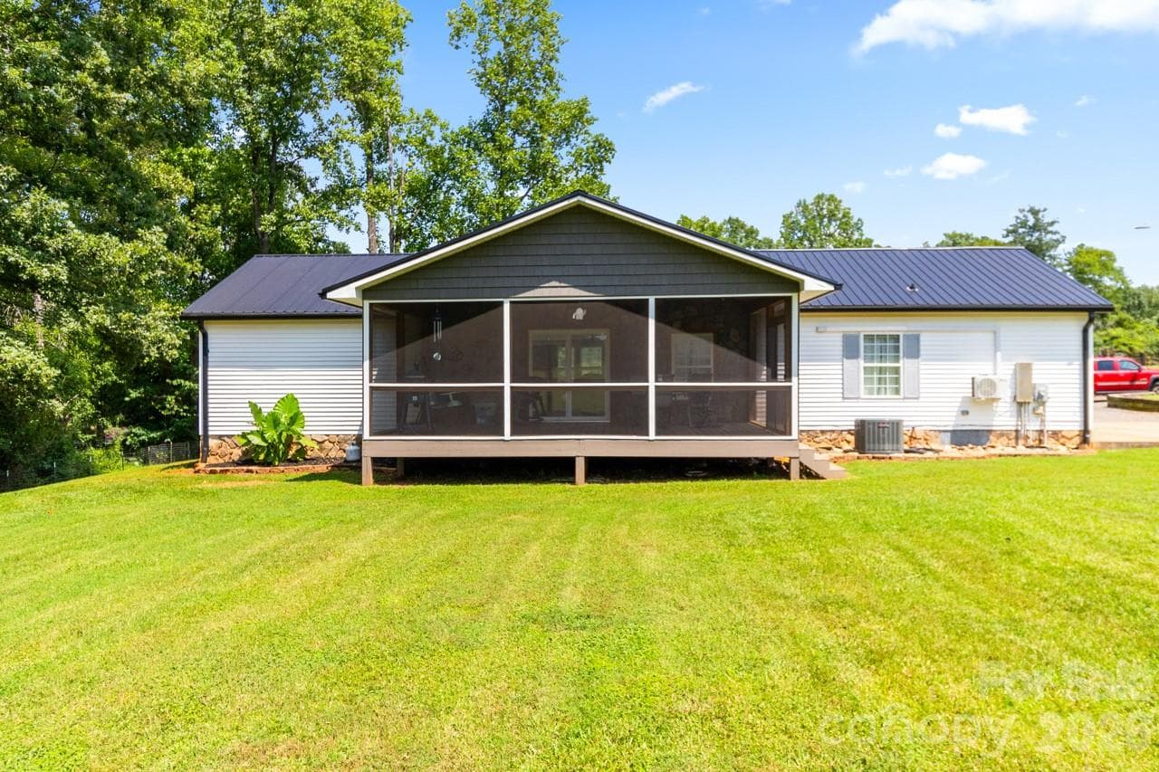 Rear view of home showcasing the magnificent screen rrom - 393 Cedar Grove Church Road, Vale