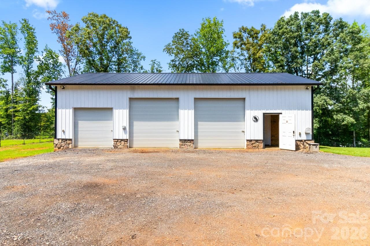 1500 sq ft metal building. Metal roof - 393 Cedar Grove Church Road, Vale