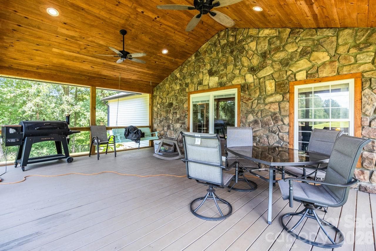 View inside screen room.Beautiful wooden ceiling. Trex flooring. Ceiling fans - 393 Cedar Grove Church Road, Vale