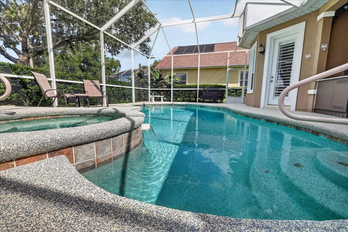 Newly surfaced pool deck. - spa with solar heated pool - 5 CAPTIVA AT LIONSPAW, DAYTONA BEACH