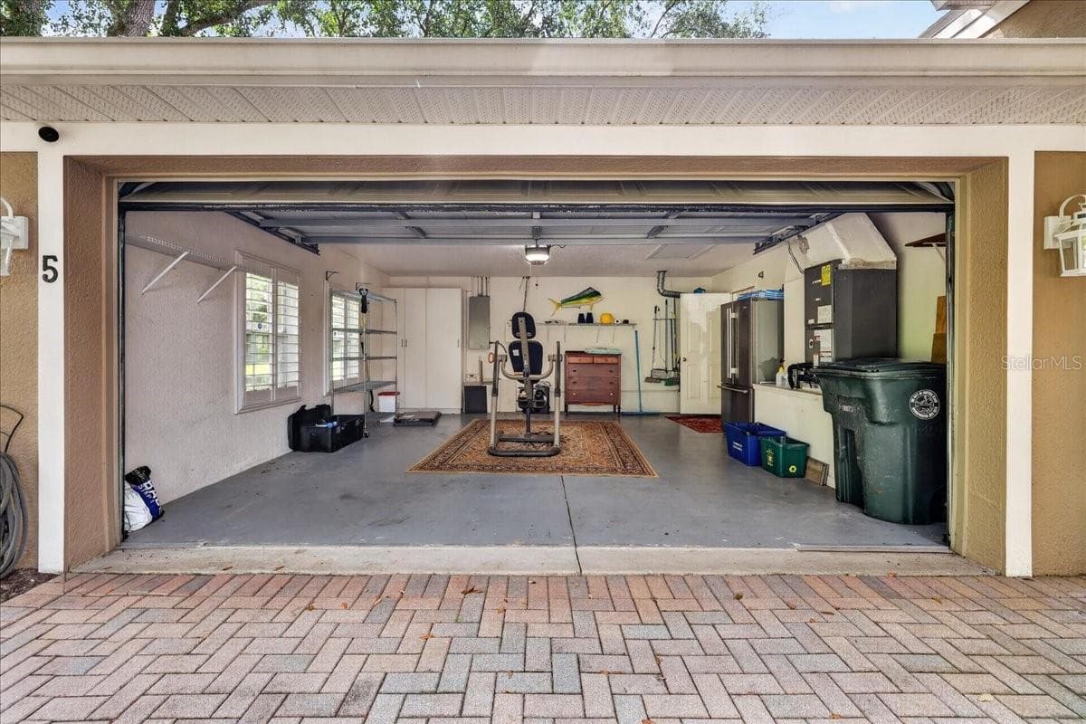 spacious garage and paver driveway - 5 CAPTIVA AT LIONSPAW, DAYTONA BEACH