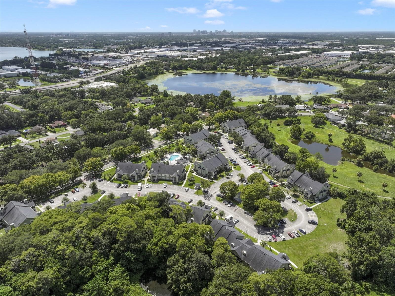 Lake Orlando and Bay Lake serve as a picturesque backdrop. - 3719 S LAKE ORLANDO PKWY #2, ORLANDO