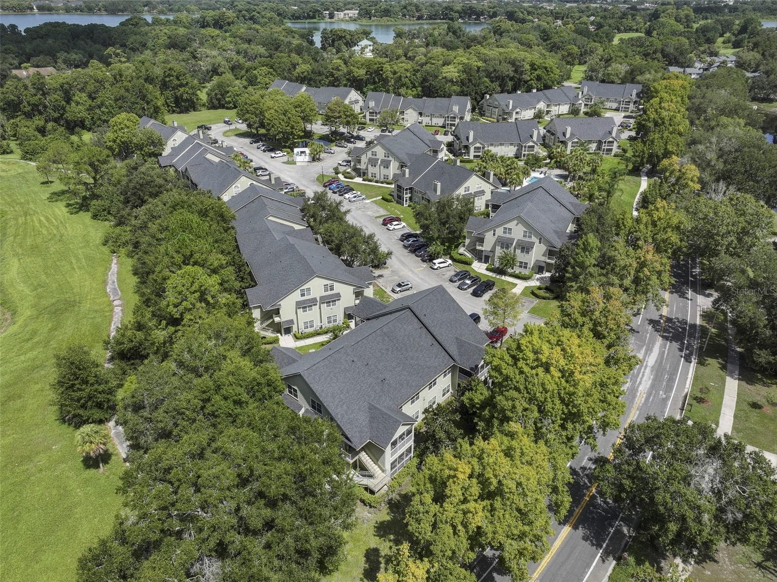 The Ashley Court community is surrounded by mature trees. - 3719 S LAKE ORLANDO PKWY #2, ORLANDO