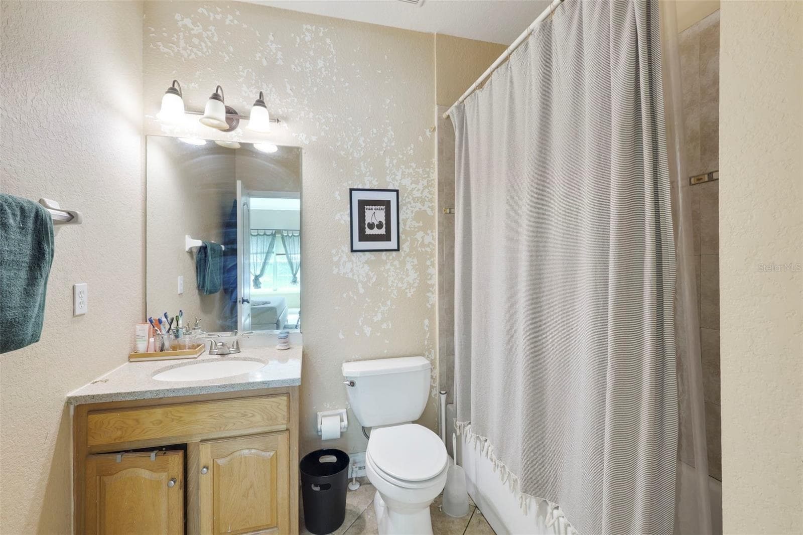 Primary en-suite bath. - 3719 S LAKE ORLANDO PKWY #2, ORLANDO