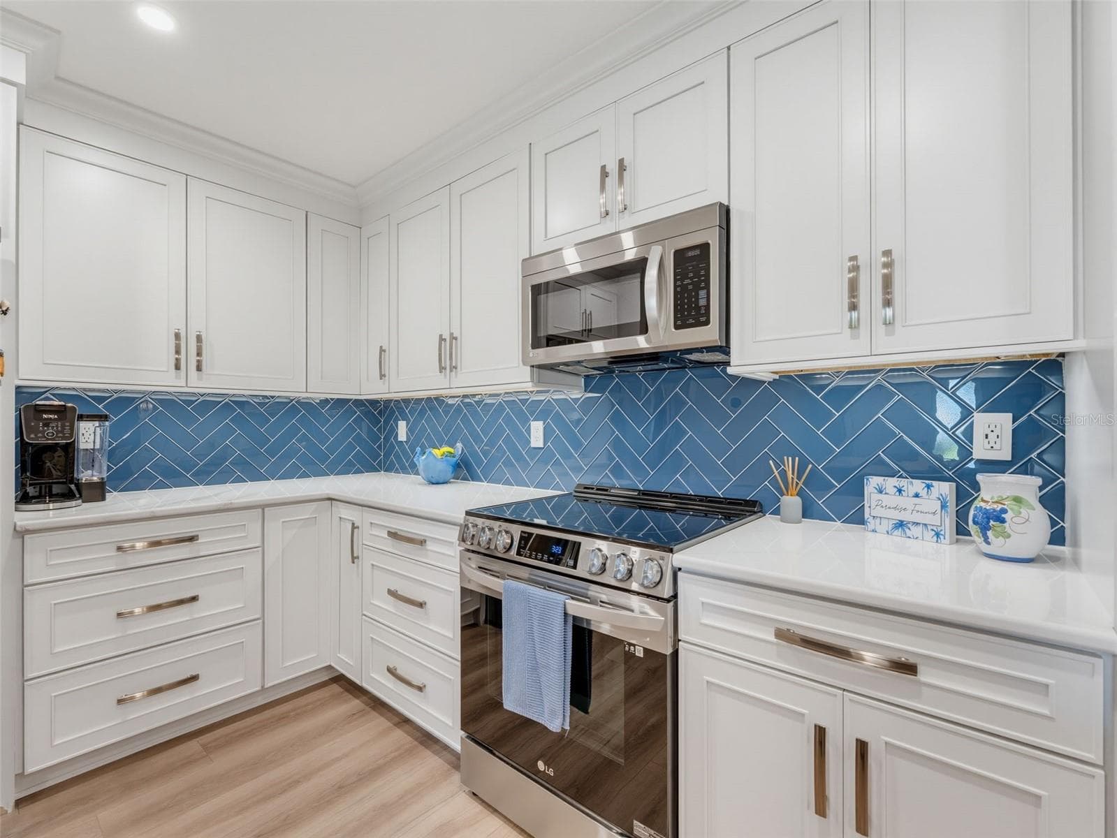 Custom Herringbone tile backsplash - 1372 CARLISLE CT, DUNEDIN