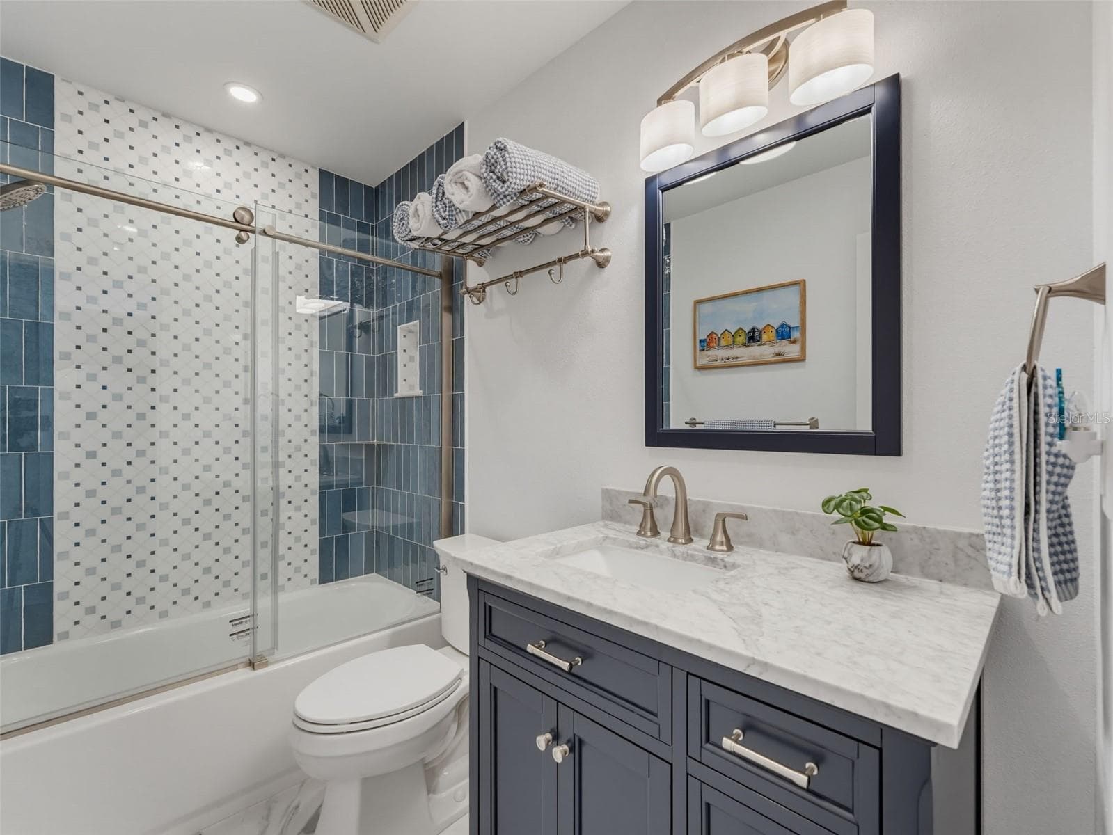 new vanity, mirror, lighting and more - 1372 CARLISLE CT, DUNEDIN