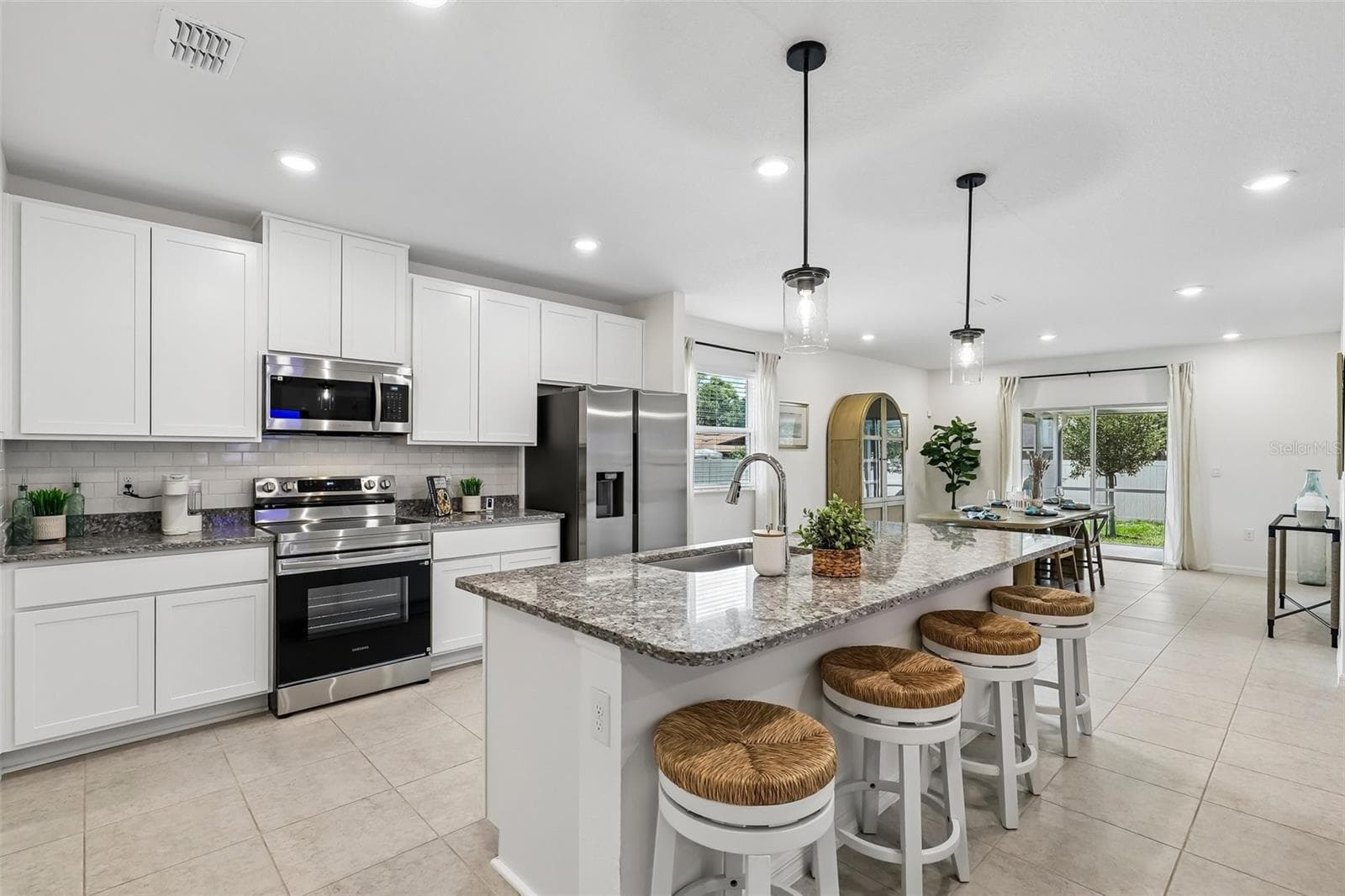 Model home - actual features may vary. - 203 HYACINTH CT, POINCIANA