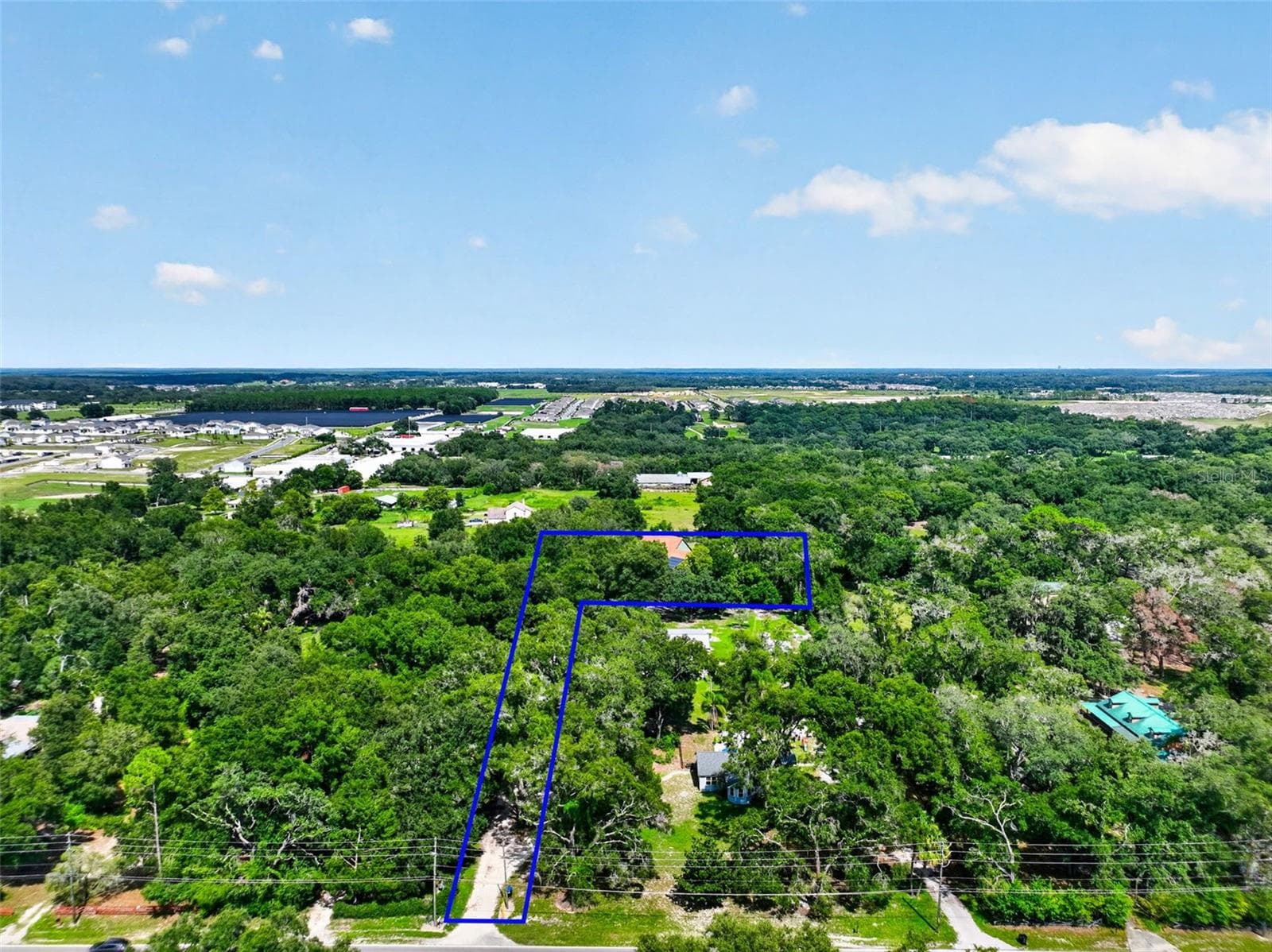 Enjoy peaceful country living while staying conveniently close to shopping, dining, and major roadways. - 4617 ROUND LAKE RD, APOPKA