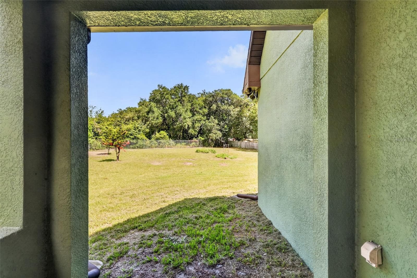 Every corner of this property offers a peaceful moment, framed by mature trees and wide-open Florida skies. - 4617 ROUND LAKE RD, APOPKA