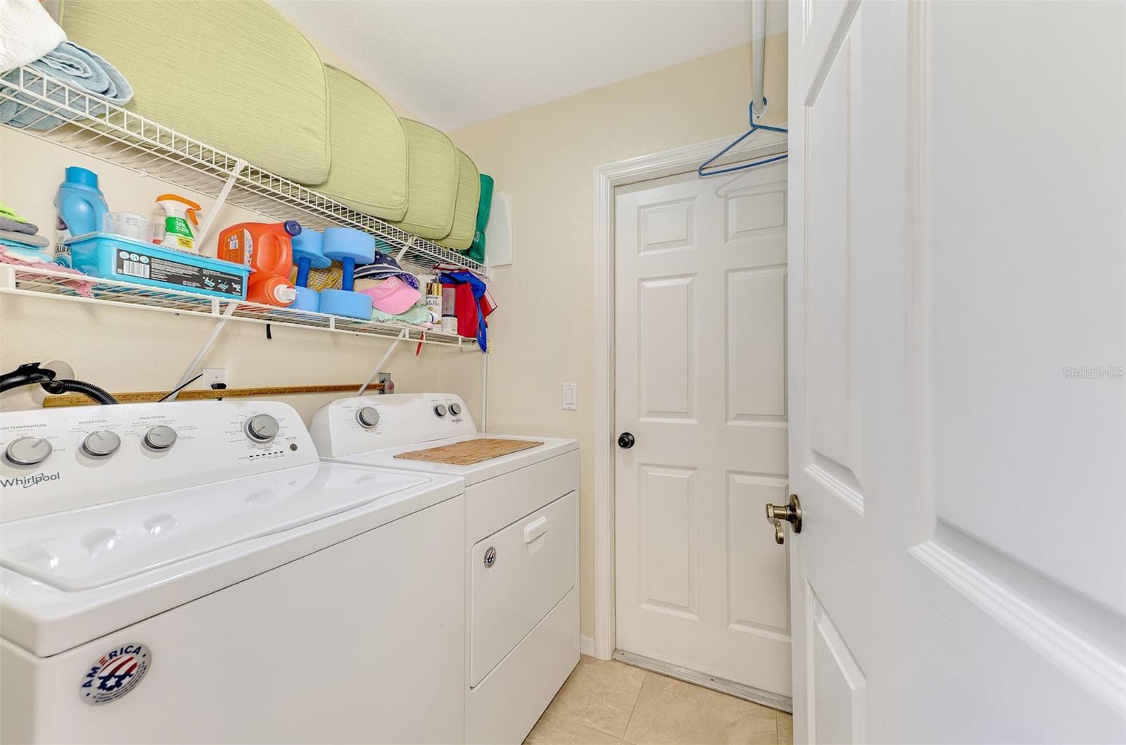 Laundry with storage - 8252 PARKSIDE DR, ENGLEWOOD
