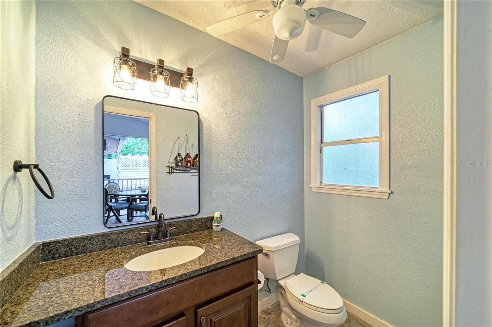 Outside half bath in Screened Lanai. - 6519 28TH AVE E, BRADENTON