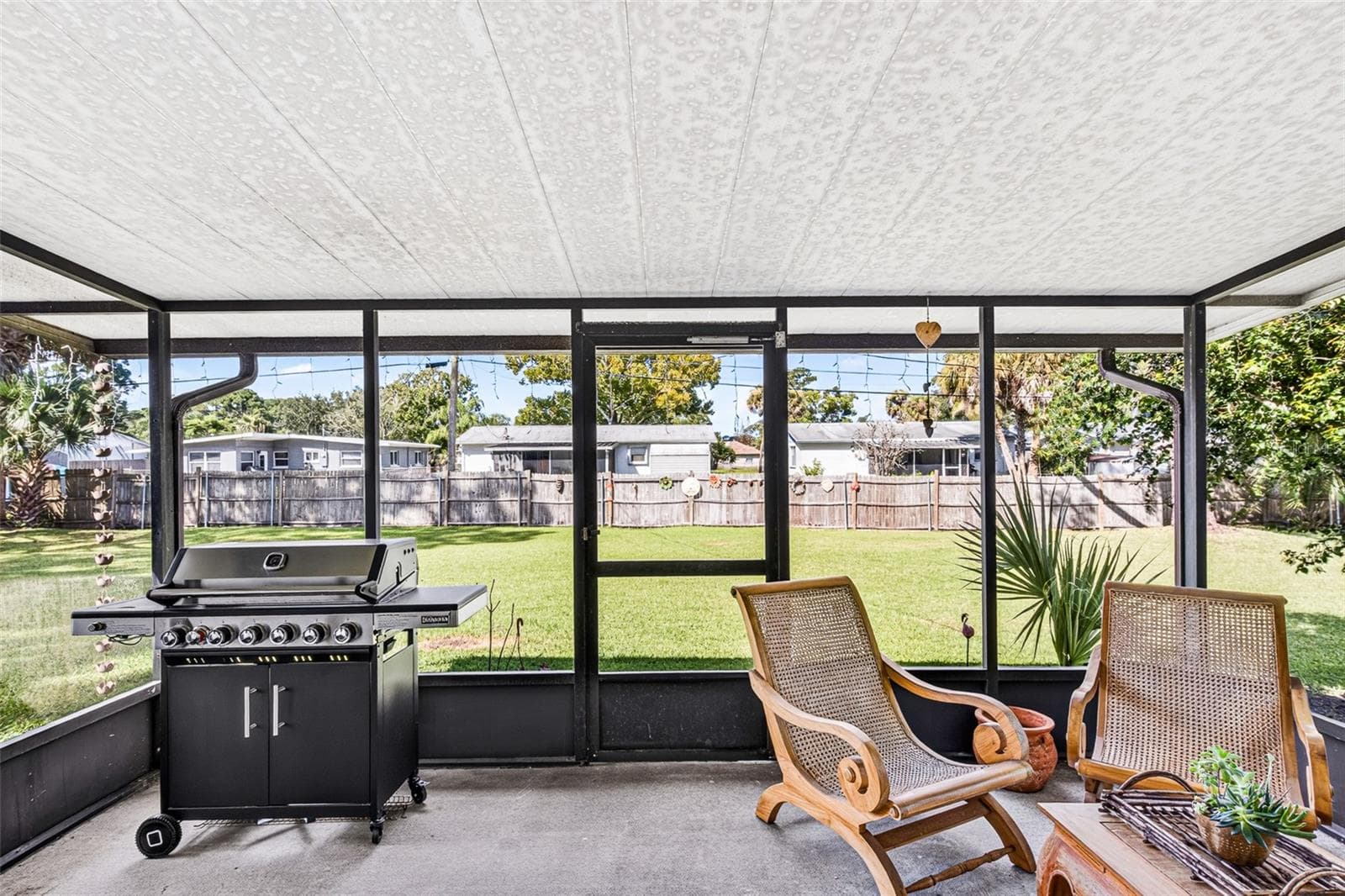 screened in patio - 2530 NORDMAN AVE, NEW SMYRNA BEACH