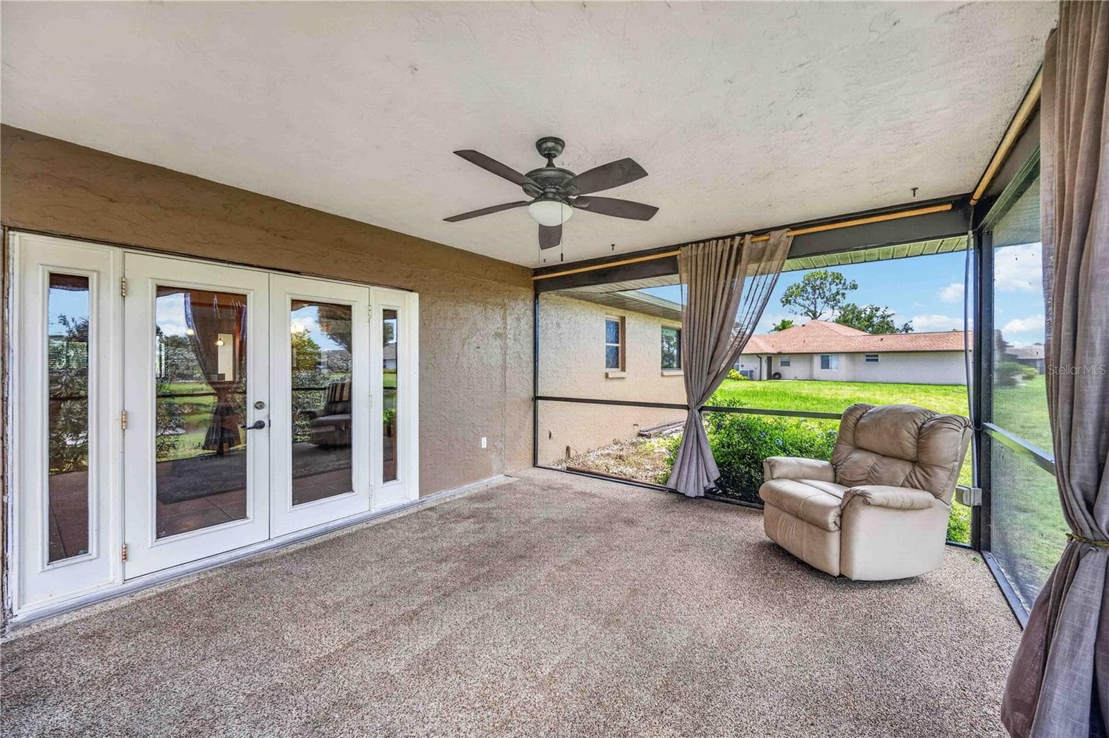 French doors to Lanai (Dining Room Access) - 166 MARK TWAIN LN, ROTONDA WEST