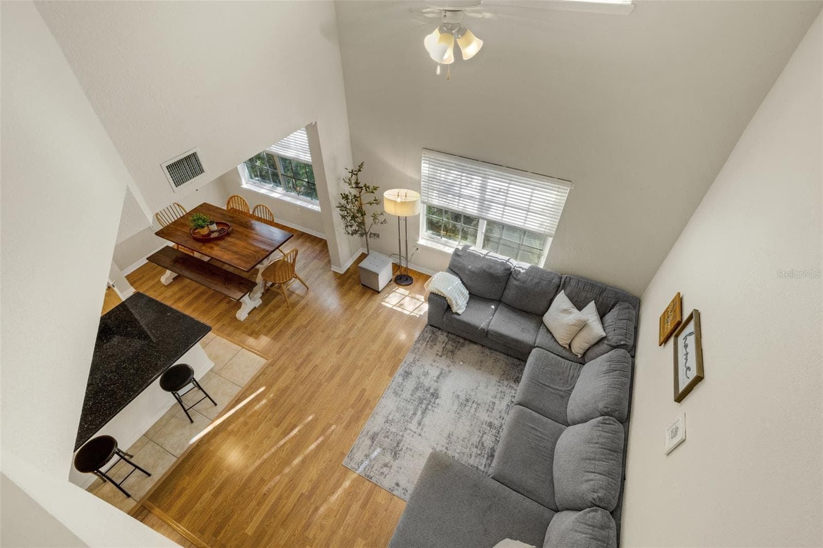 View of Open Living Area from Staircase - 9872 MEADOW FIELD CIR #503, TAMPA