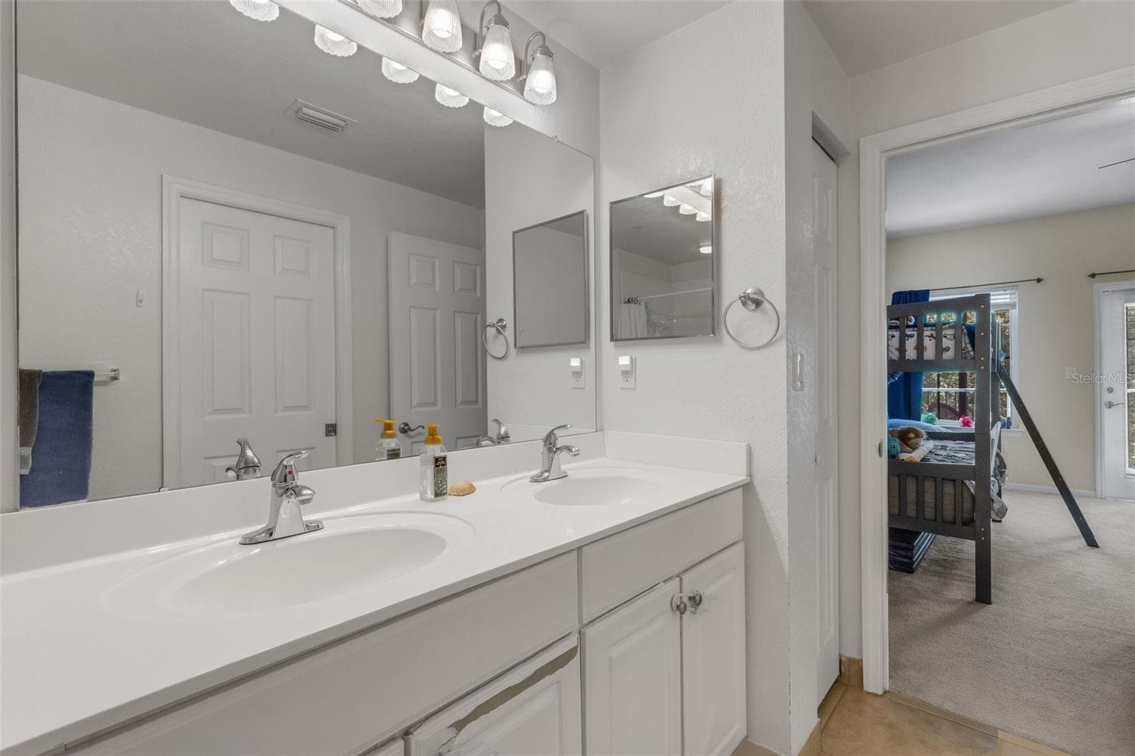 Primary Bathroom with Dual Vanities - 9872 MEADOW FIELD CIR #503, TAMPA
