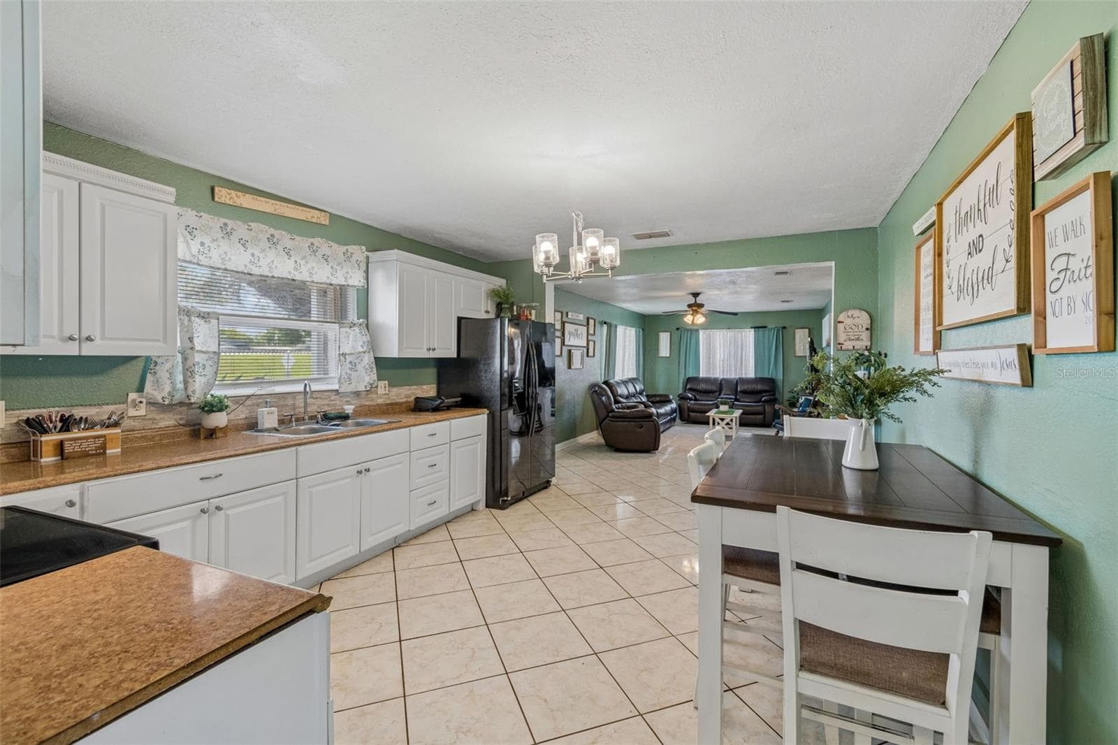 Single Family Residence at 7307 N HUNTLEY AVE, TAMPA, photo 9 of 33