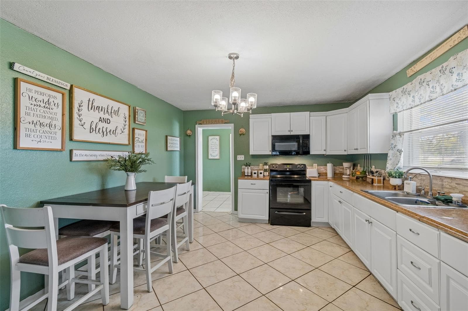 Single Family Residence at 7307 N HUNTLEY AVE, TAMPA, photo 12 of 33
