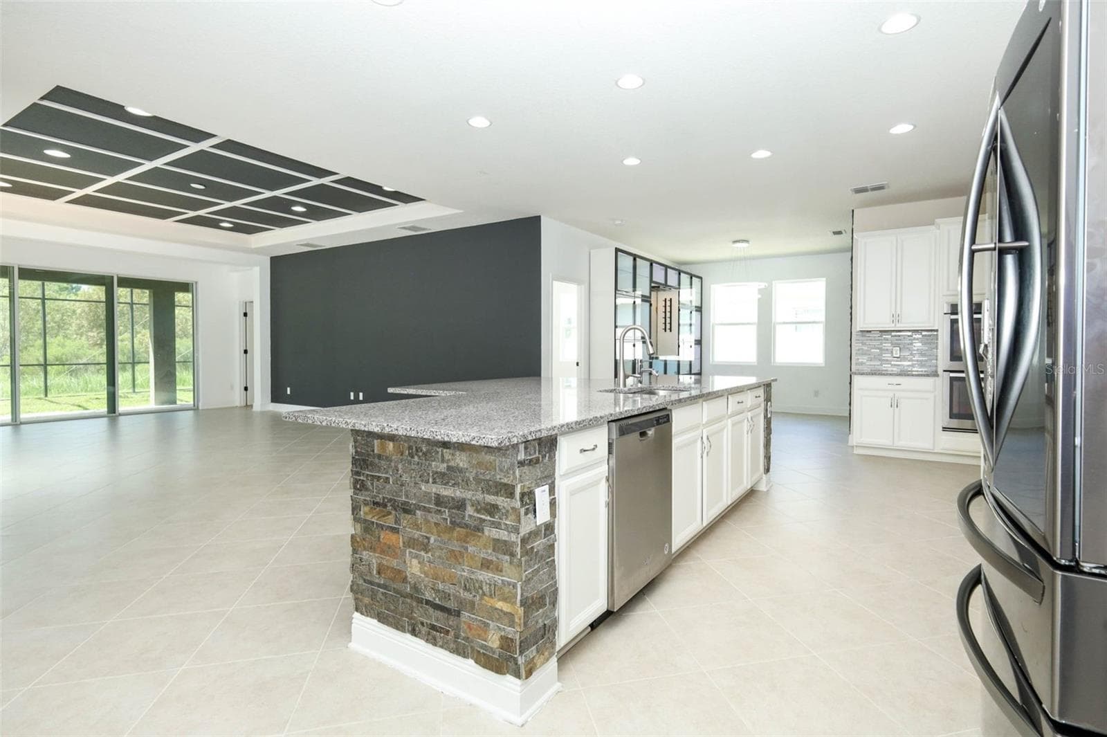 FAMILY ROOM & KITCHEN - 12397 STONE BARK TRL, ORLANDO