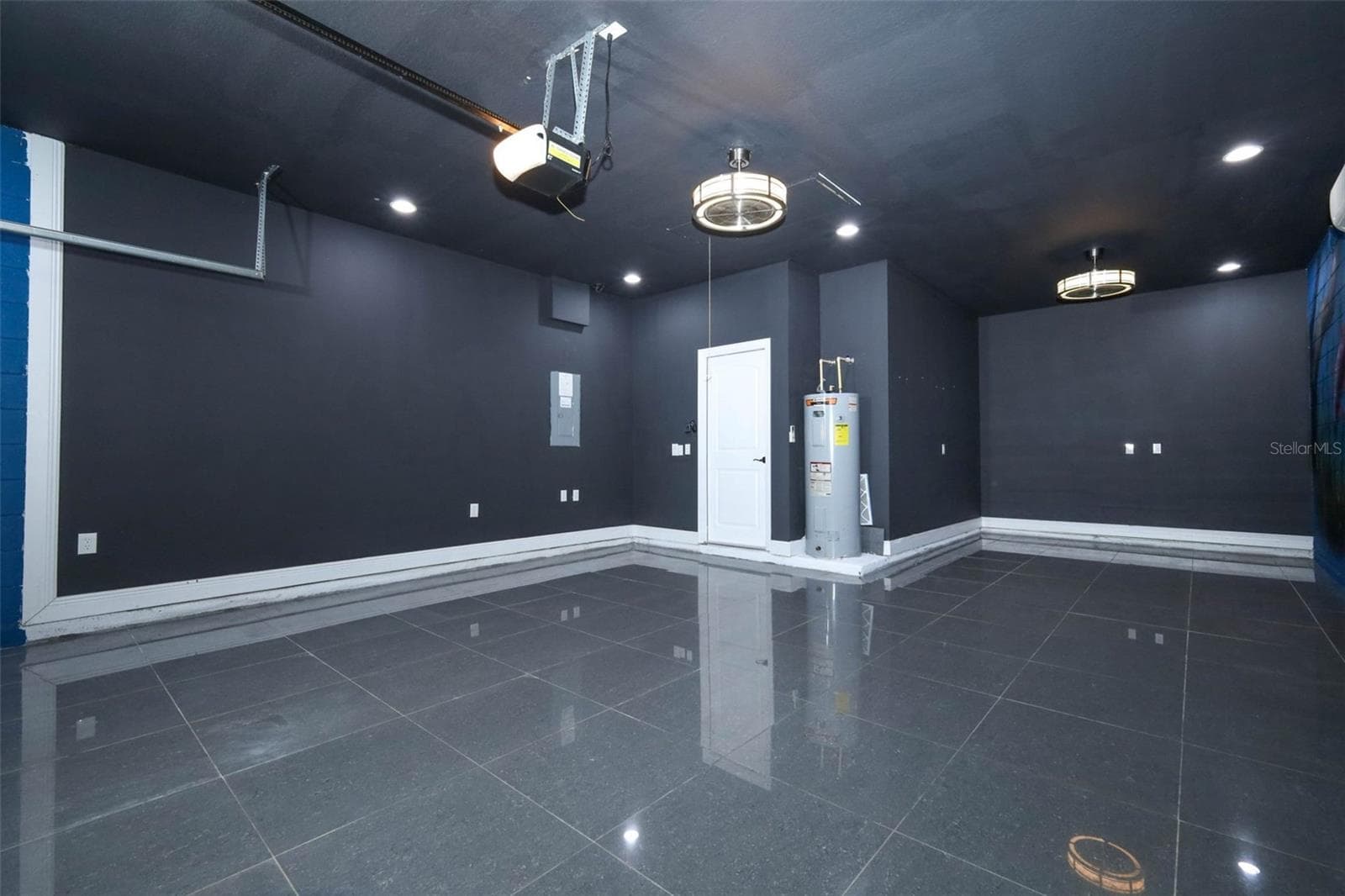 2 CAR GARAGE COMPLETELY VENTILATED WITH SPLIT UNIT AC,FANS, SPOT LIGHTS FOR YOUR CAR OR ENTTERTAIMENT ROOM - 12397 STONE BARK TRL, ORLANDO