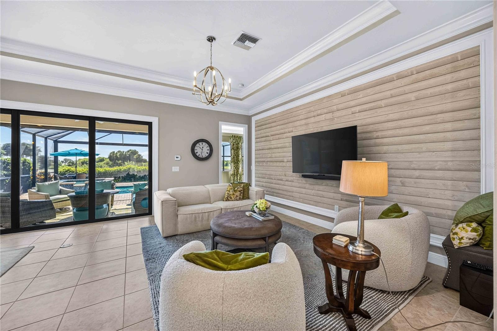Custom 9" Crown Molding and Stunning Shiplap feature wall. - 24232 GALLBERRY DR, VENICE