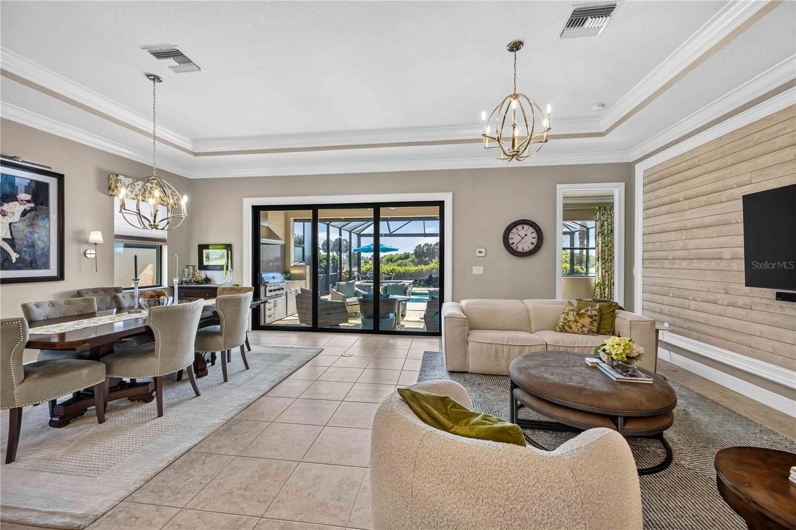 Open concept dining room to living room - 24232 GALLBERRY DR, VENICE