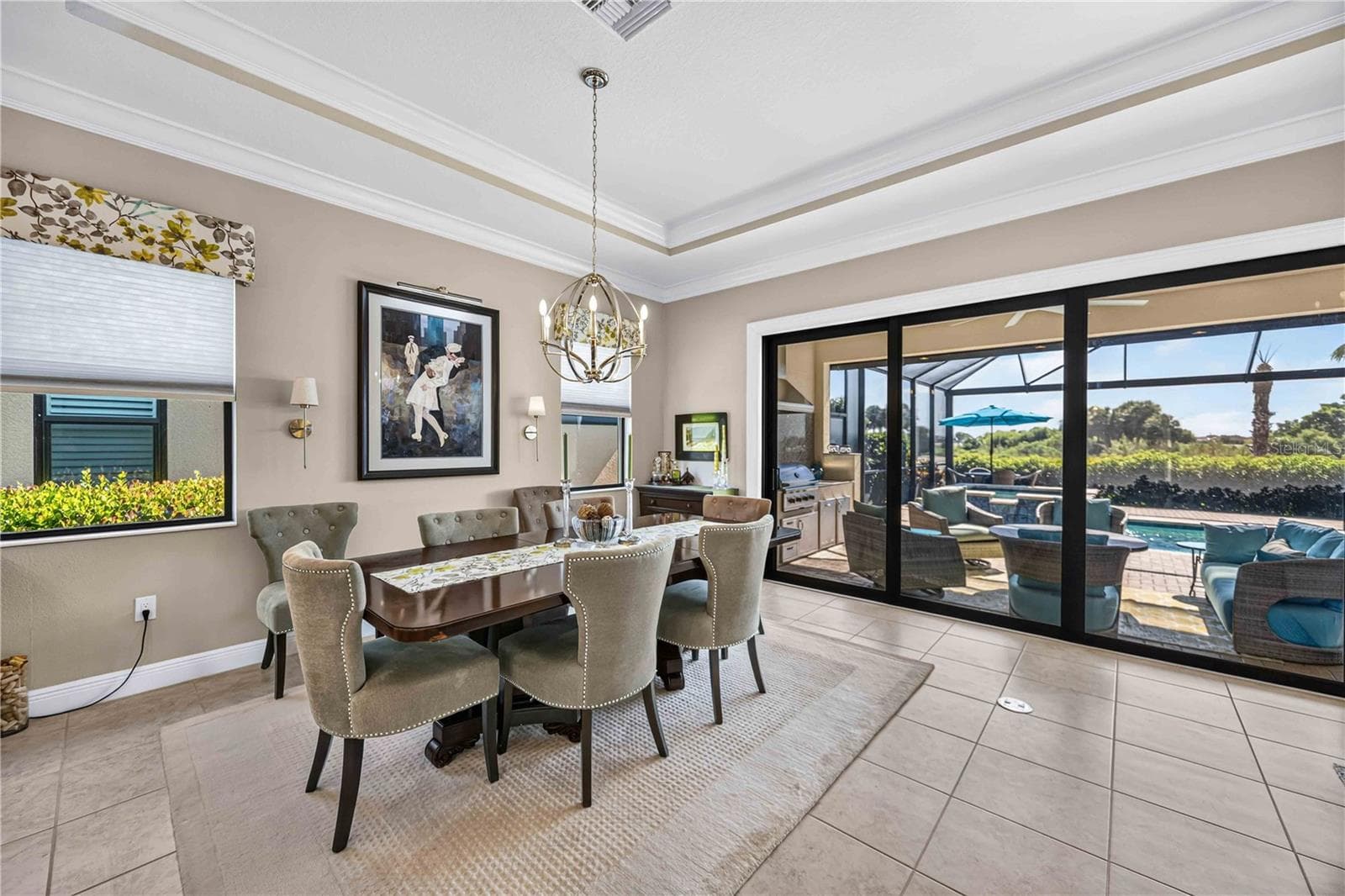 The dining room has plenty of space for small to large dinner parties - 24232 GALLBERRY DR, VENICE