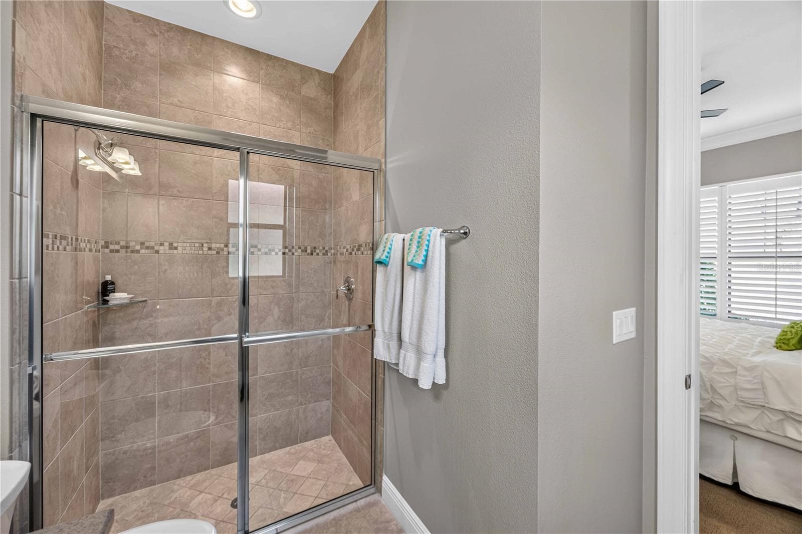 Ensuite Bedroom #2 with a full shower - 24232 GALLBERRY DR, VENICE