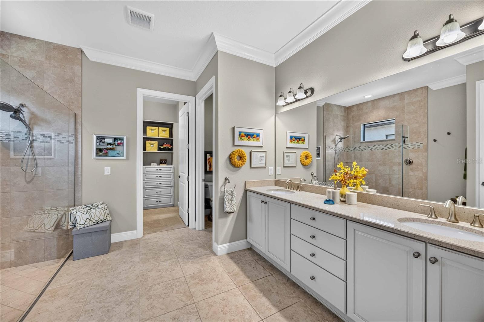 dual sinks in the counters and independent shower with private water closet. - 24232 GALLBERRY DR, VENICE