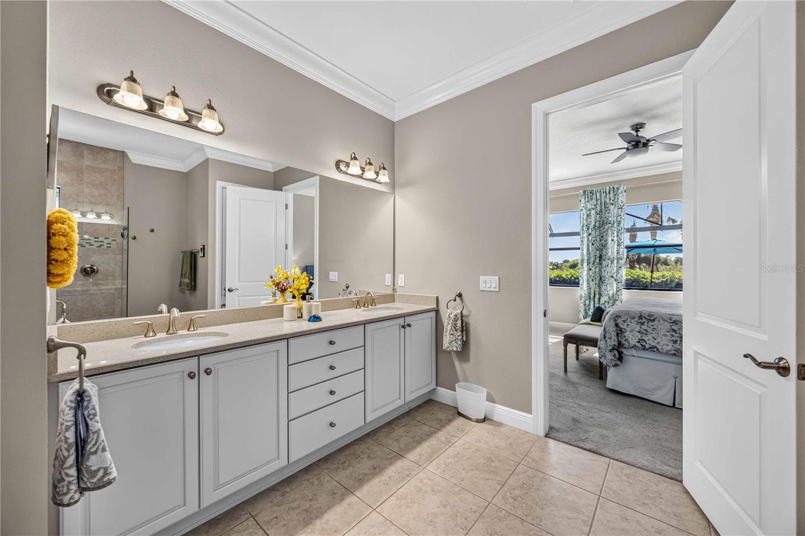 dual sinks in the counters and independent shower with private water closet. - 24232 GALLBERRY DR, VENICE