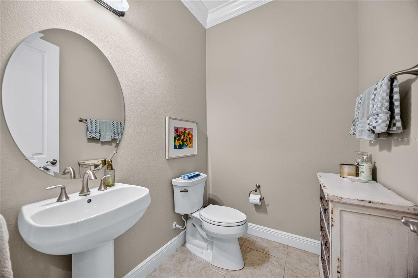 The envy of all other homes with a powder room for guests - 24232 GALLBERRY DR, VENICE