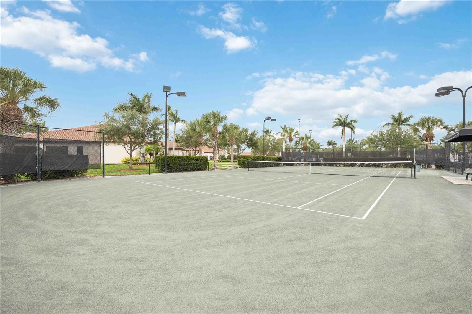 Har Tru Tennis courts at your disposal - 24232 GALLBERRY DR, VENICE