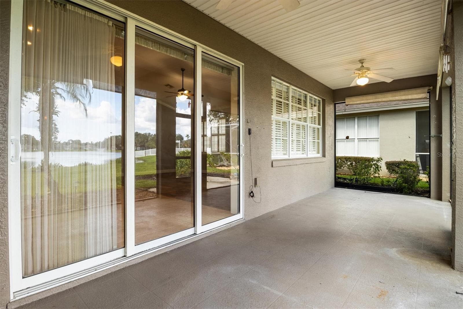 Rear Patio - 8281 LAKE JAMES DR, LAKELAND