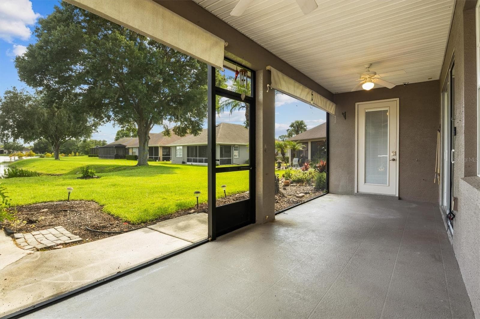 Rear Patio - 8281 LAKE JAMES DR, LAKELAND
