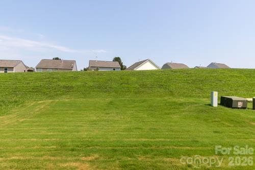Burm in Backyard allows privacy - 216 Crane Creek Way, Lexington