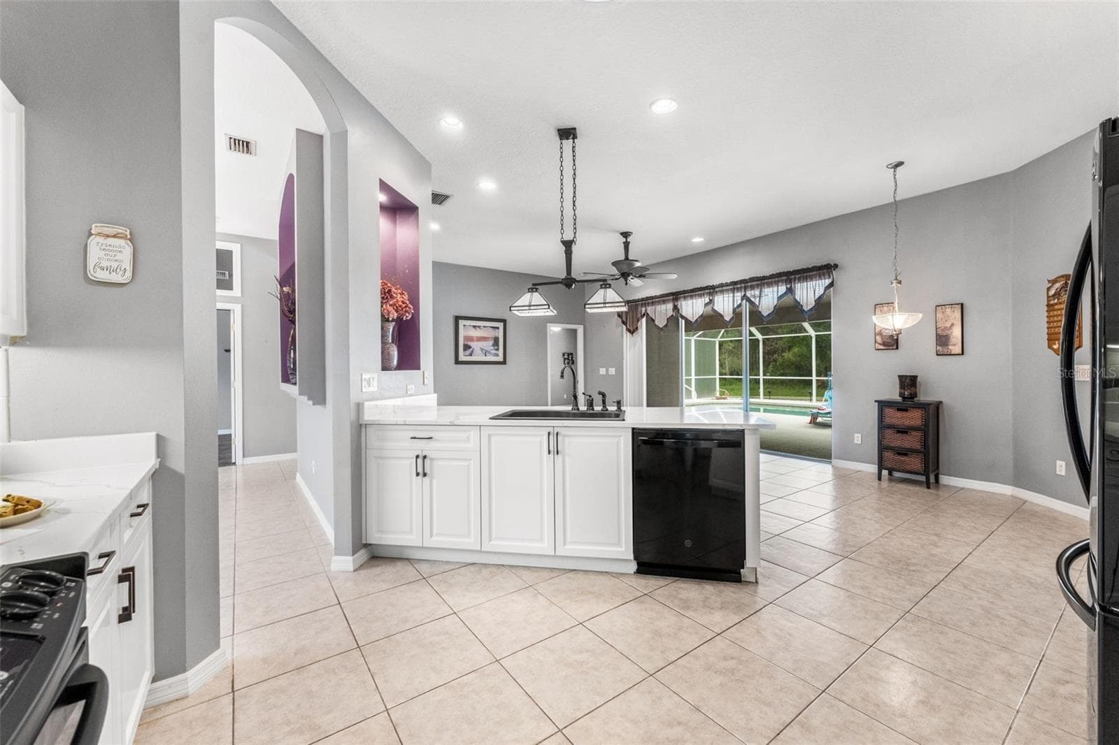Renovated kitchen w/ open layout - 1903 CREEKWATER BLVD, PORT ORANGE