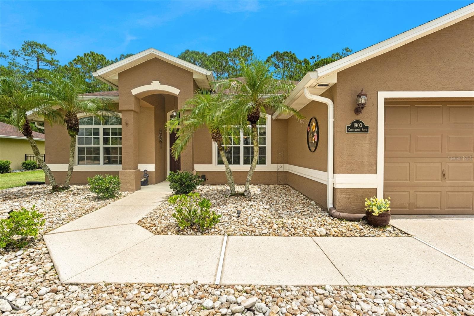 Low maintenance entry. - 1903 CREEKWATER BLVD, PORT ORANGE