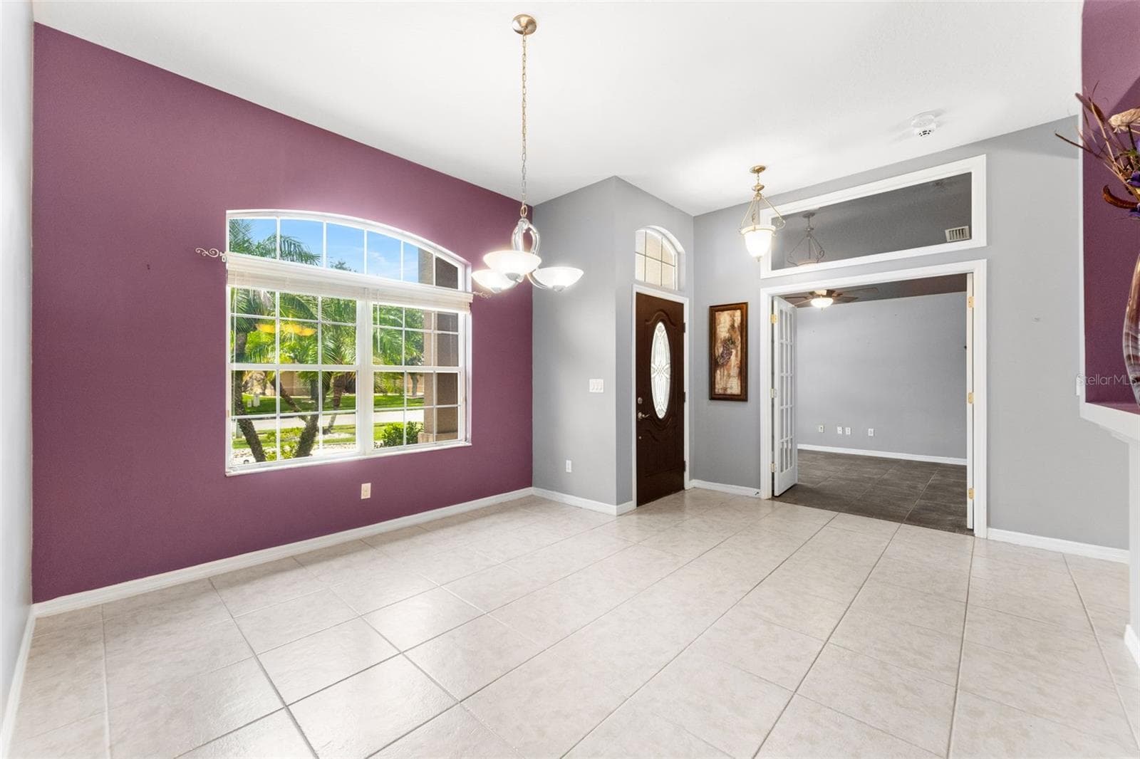 Formal dining area with view of entry and Bdrm 2. - 1903 CREEKWATER BLVD, PORT ORANGE