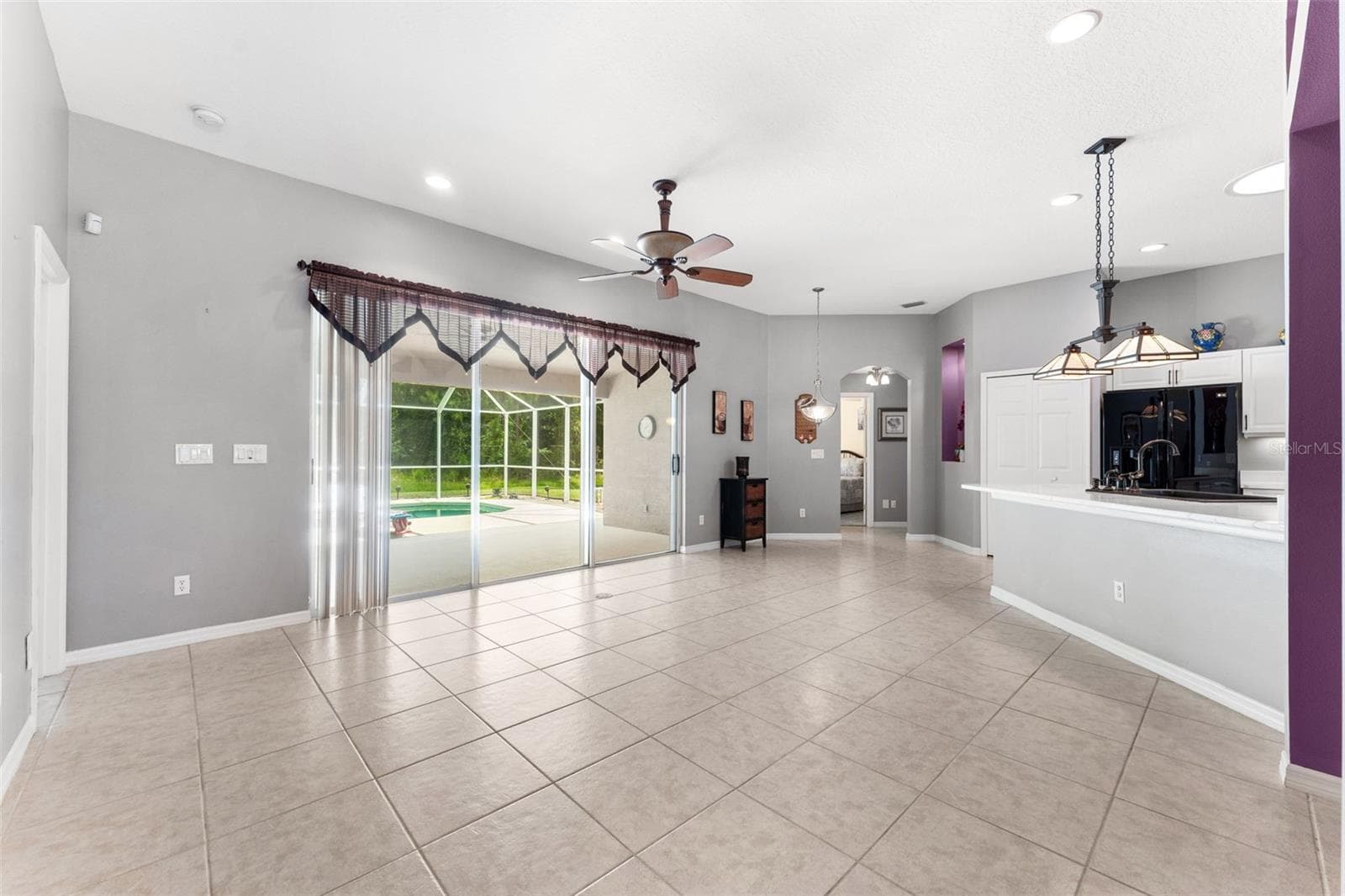 View to kitchen and pool. - 1903 CREEKWATER BLVD, PORT ORANGE