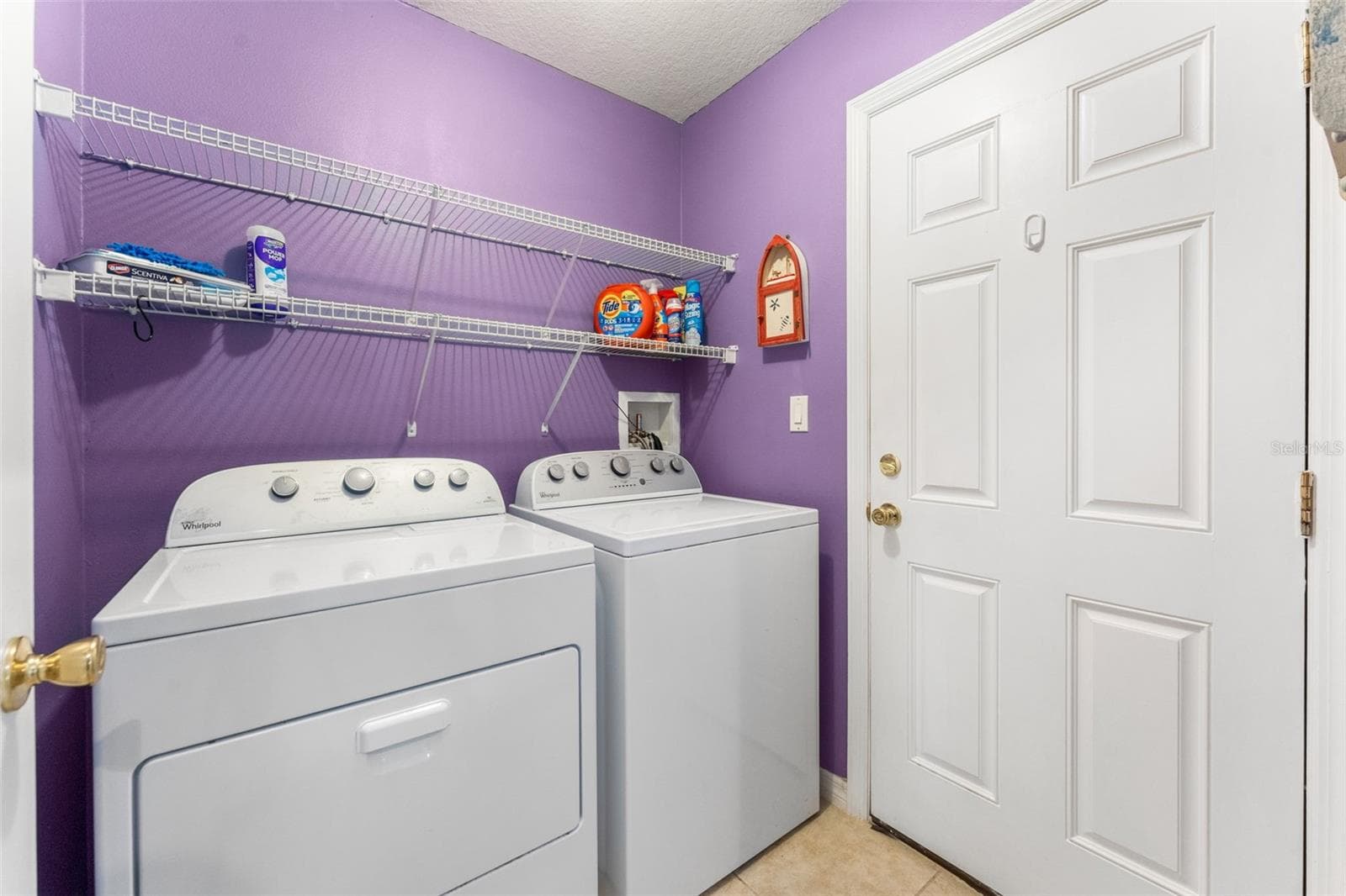Laundry room to 3-Car garage - 1903 CREEKWATER BLVD, PORT ORANGE