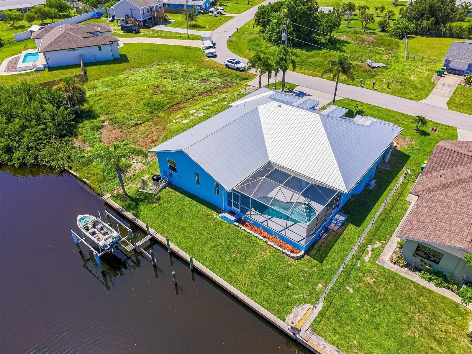 Single Family Residence at 206 S WATERWAY DR NW, PORT CHARLOTTE, photo 4 of 56