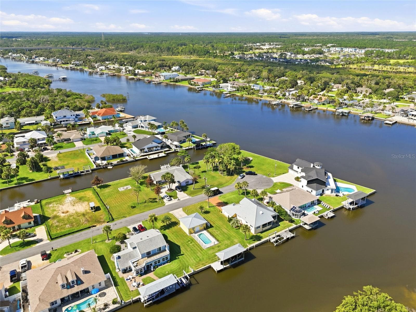 Aerial view — Wide aerial view over the mangrove-lined waterway and marsh islands leading to the Intracoastal Waterway and Atlantic Ocean. - 342 N 12TH ST, FLAGLER BEACH