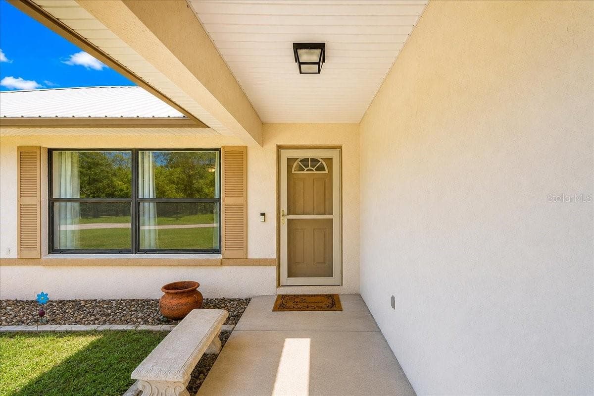 Single Family Residence at 21875 NE 135TH LN, FORT MC COY, photo 9 of 38