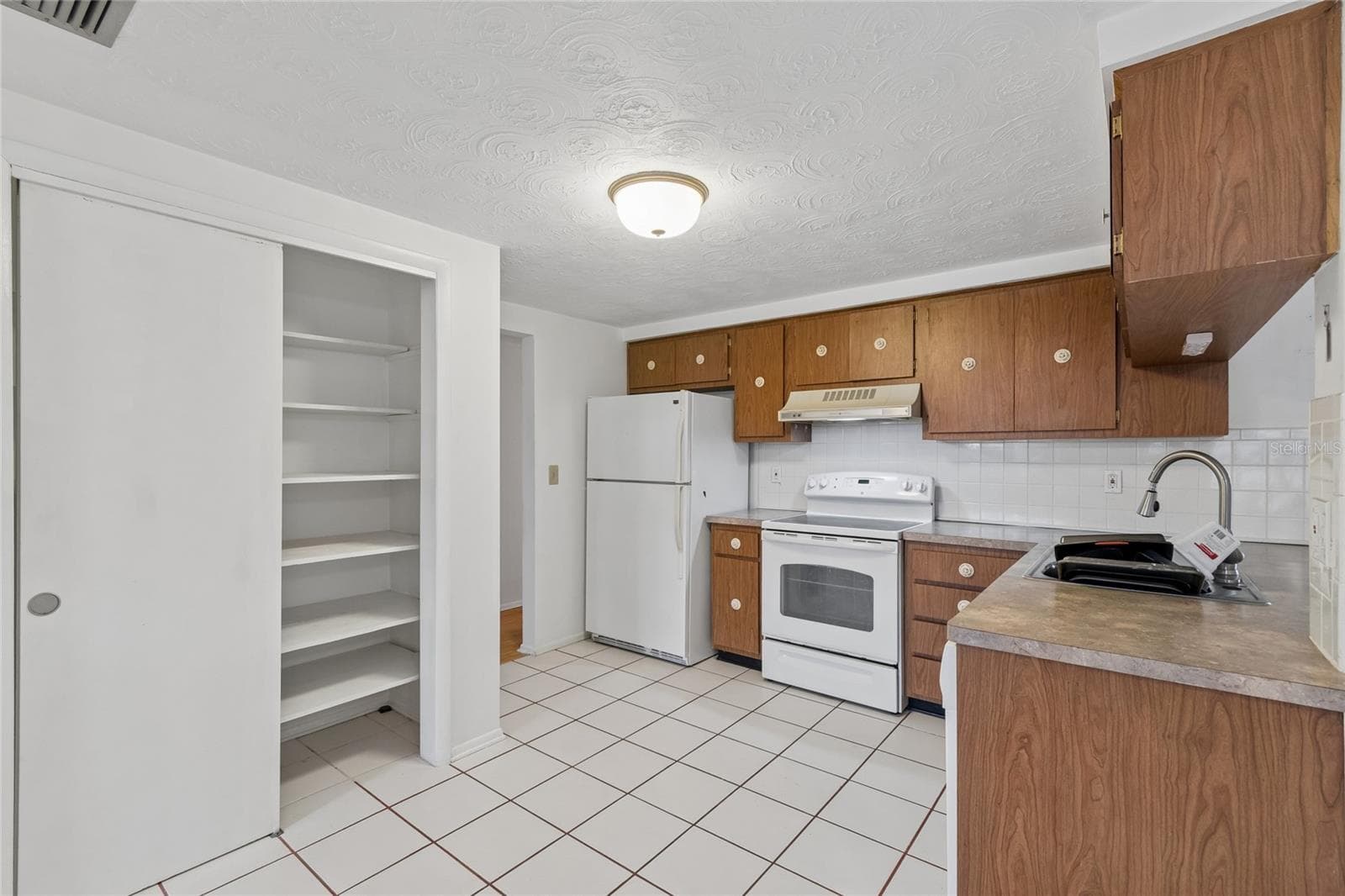 Single Family Residence at 3416 CHAUNCY RD, HOLIDAY, photo 11 of 26