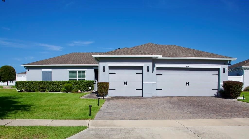 Single Family Residence at 411 BLUE LAKE CIR, KISSIMMEE, photo 2 of 25